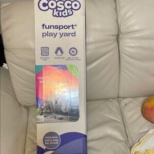 Blue and Purple Play Yard with Colorful Graphic